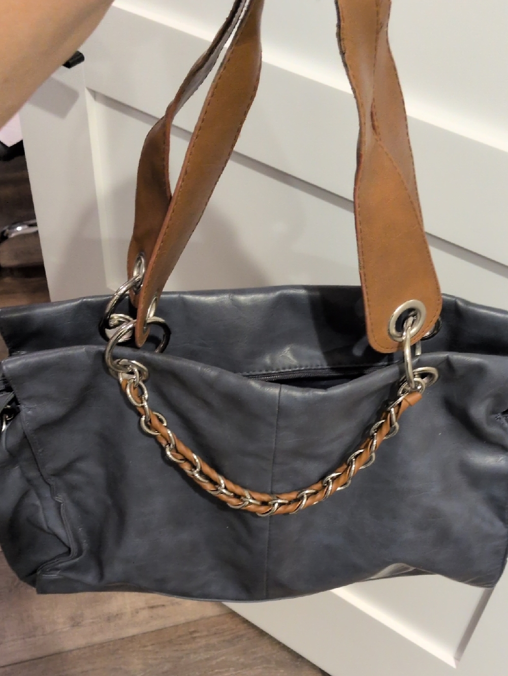 Elegant Gray Leather Shoulder Bag with Tan Straps and Chain Accent